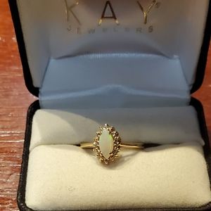 14k gold stsmped opal ring with diamonds